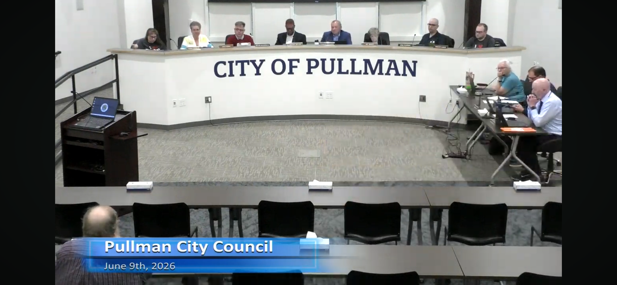 Mayor Francis Benjamin and the city council listen to public comments.